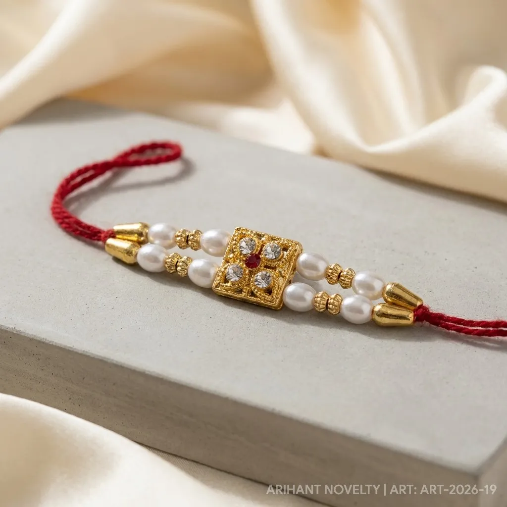 Ruby Dot White Pearl Rakhi – handmade Meenakari rakhi from Bikaner by Arihant Novelty