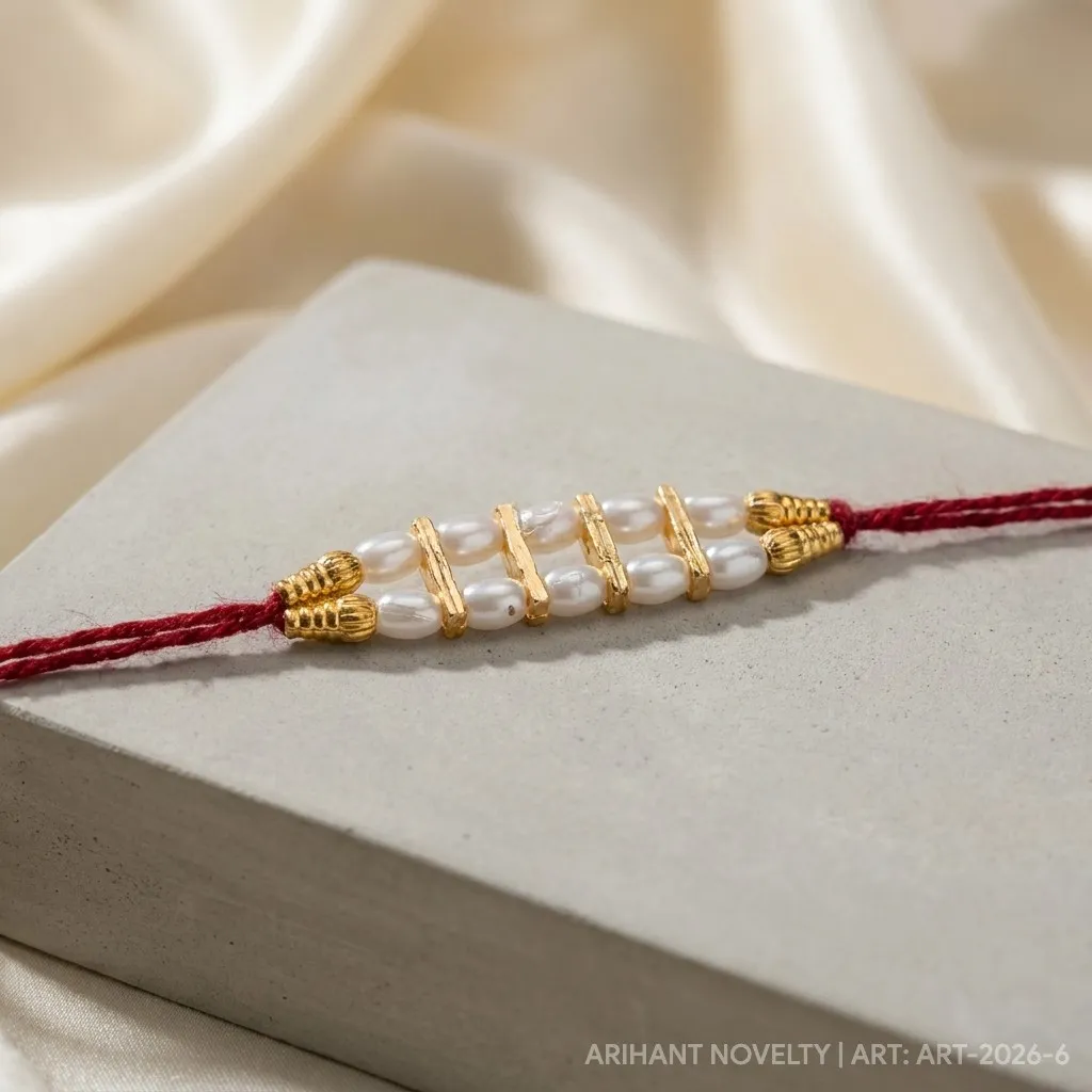 Pearl Strand with Gold Dividers – handmade Traditional rakhi from Bikaner by Arihant Novelty